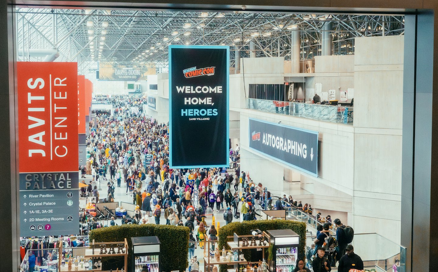 Crowds walk through the bustling Javits Center during Comic Con.